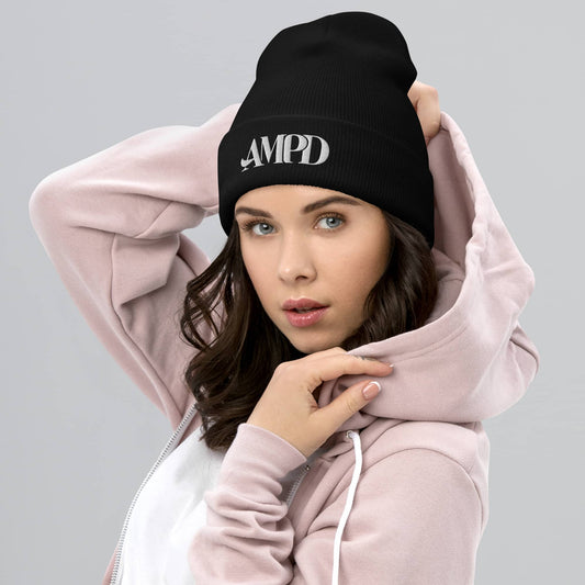 Stylish black Amp'd Up Logo Cuffed Beanie worn by a model with a hoodie for warmth and fashion
