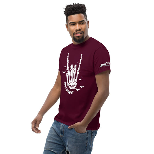 Man wearing a maroon Stay Spooky T-Shirt with a skeleton hand graphic and Amp'd Up Custom logo on sleeve
