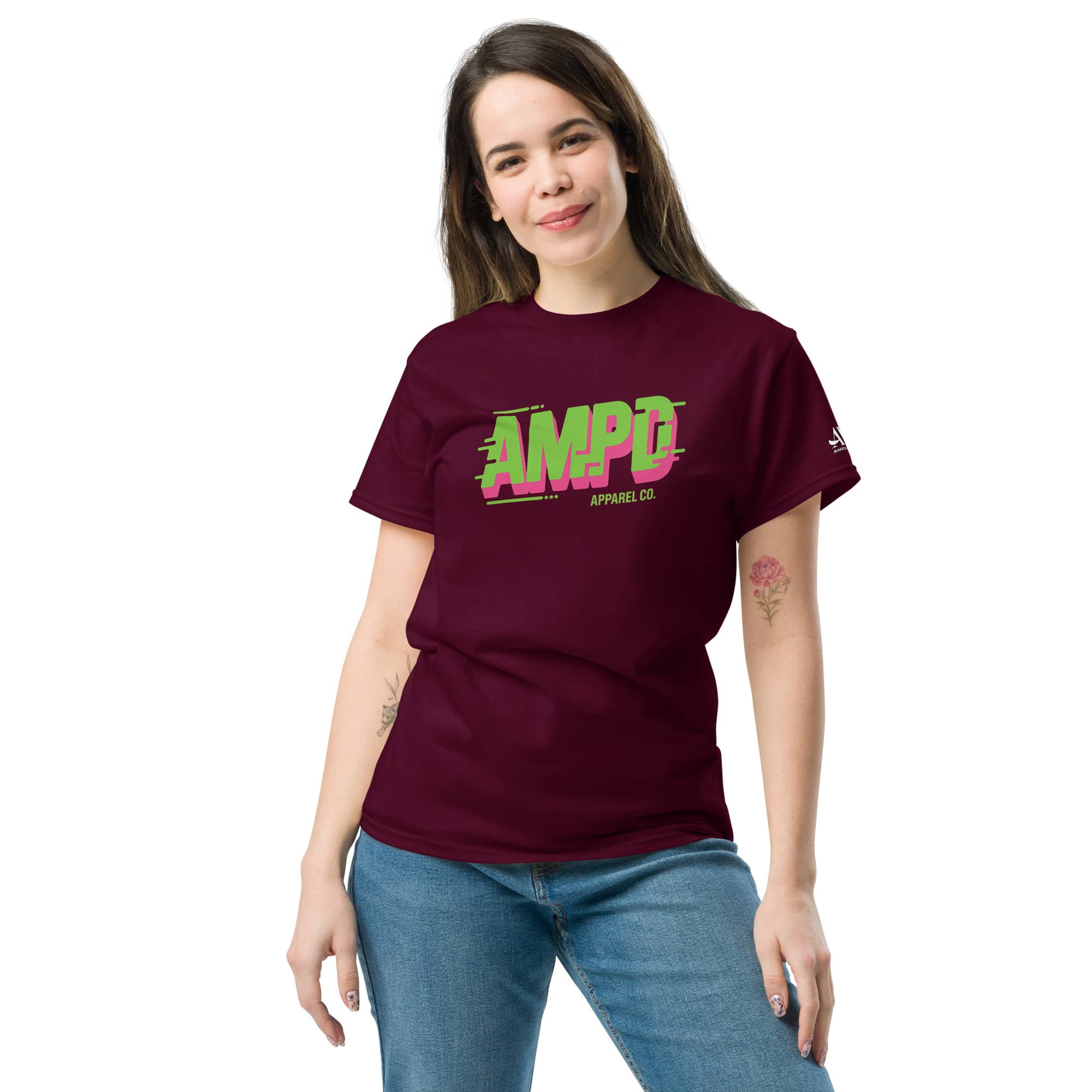 Woman wearing a maroon AMPD Apparel Company T-Shirt showcasing a vibrant logo design