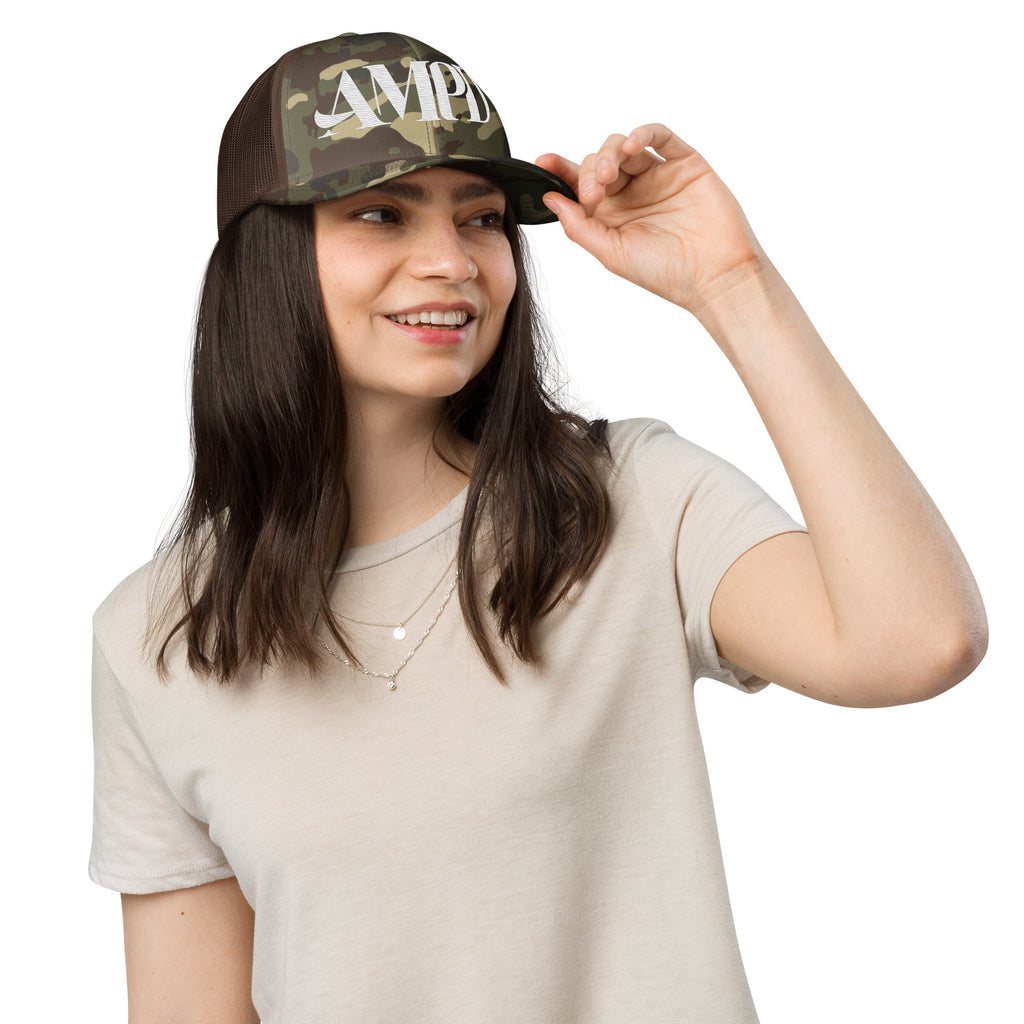 AMPD Embroidered Camouflage Trucker Hat worn by a woman with a casual beige shirt