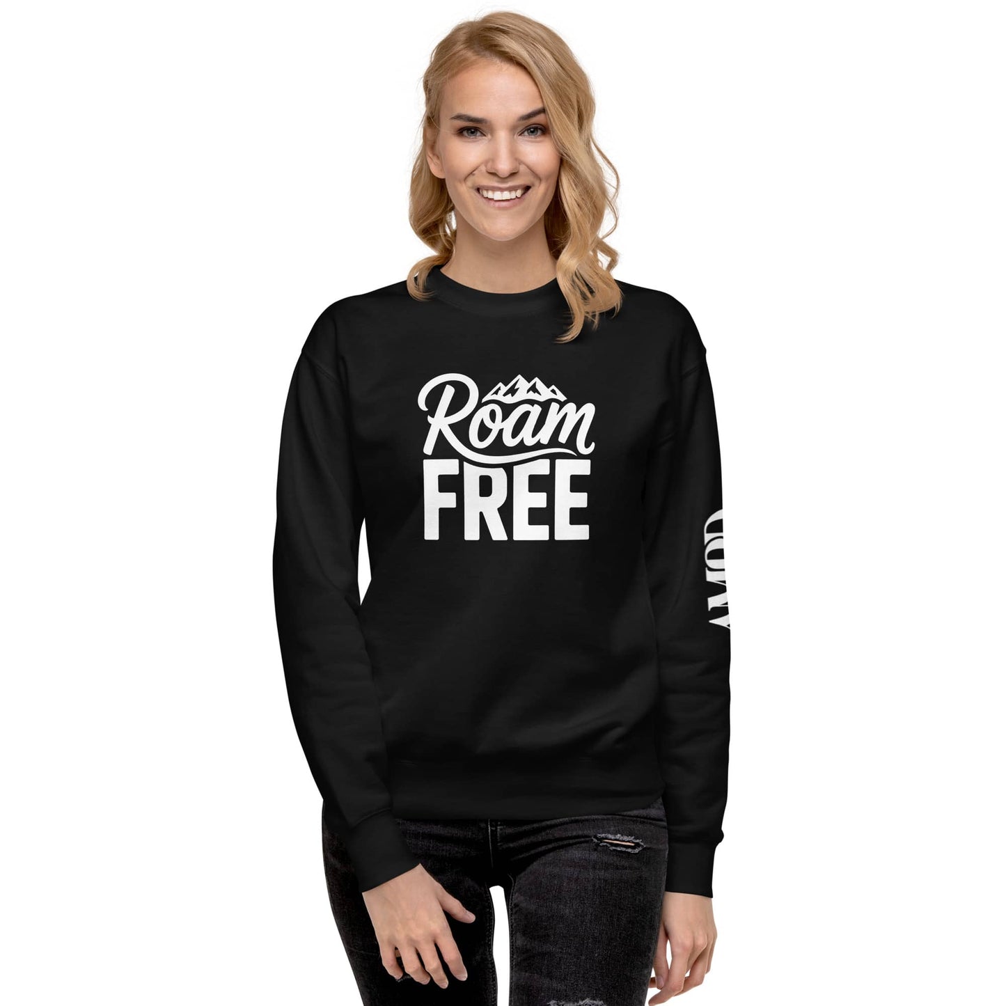 Woman wearing black Roam Free Sweatshirt Outdoor Explorer Tee for Hikers, Travelers & Wanderers with mountain graphic