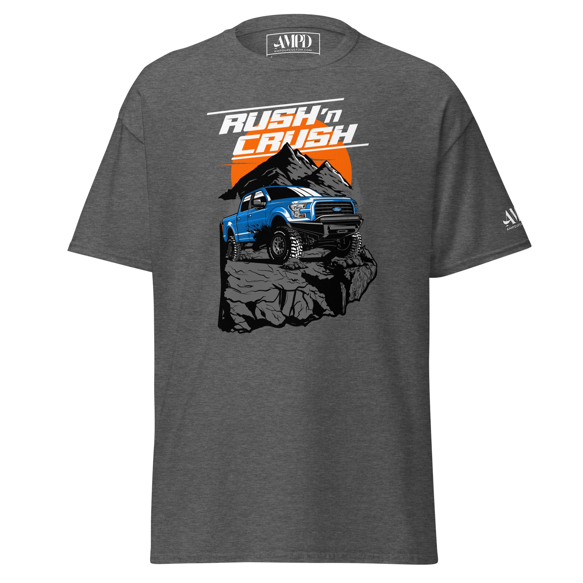 Rush n Crush Off-Road T-Shirt | AMPD featuring a blue truck on a rocky mountain graphic