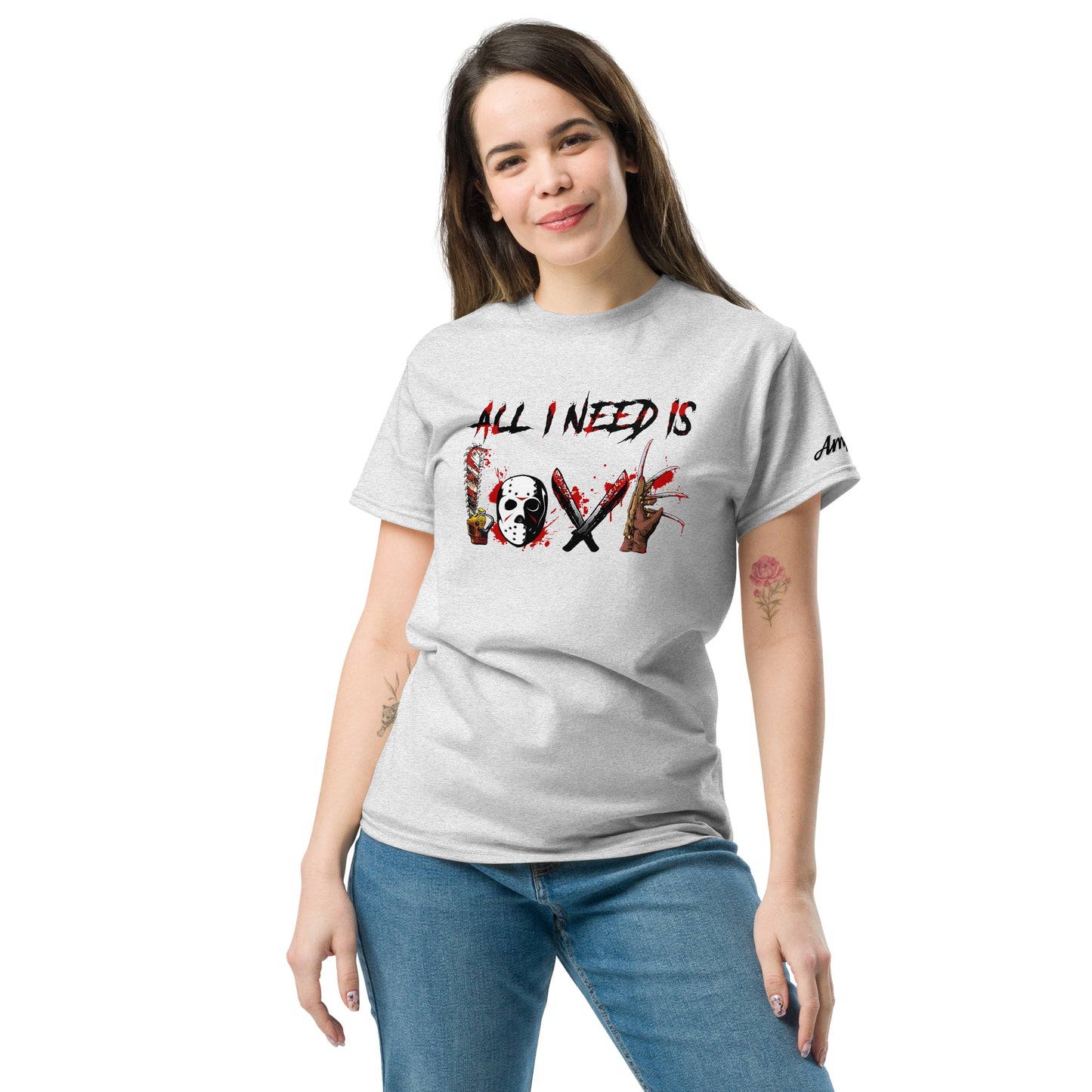 Woman wearing All I Need Is Love T-Shirt with horror movie themed letters in gray