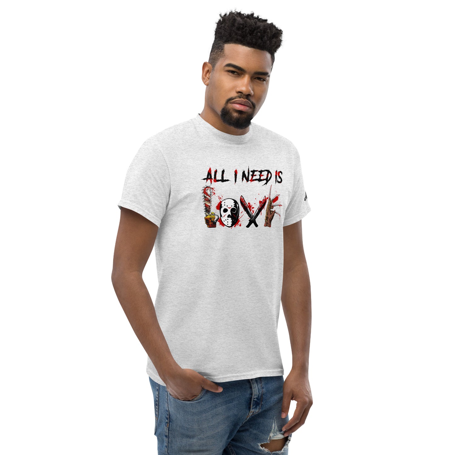 Man wearing All I Need Is Love T-Shirt by Amp'd Up Custom with graphic text design in white