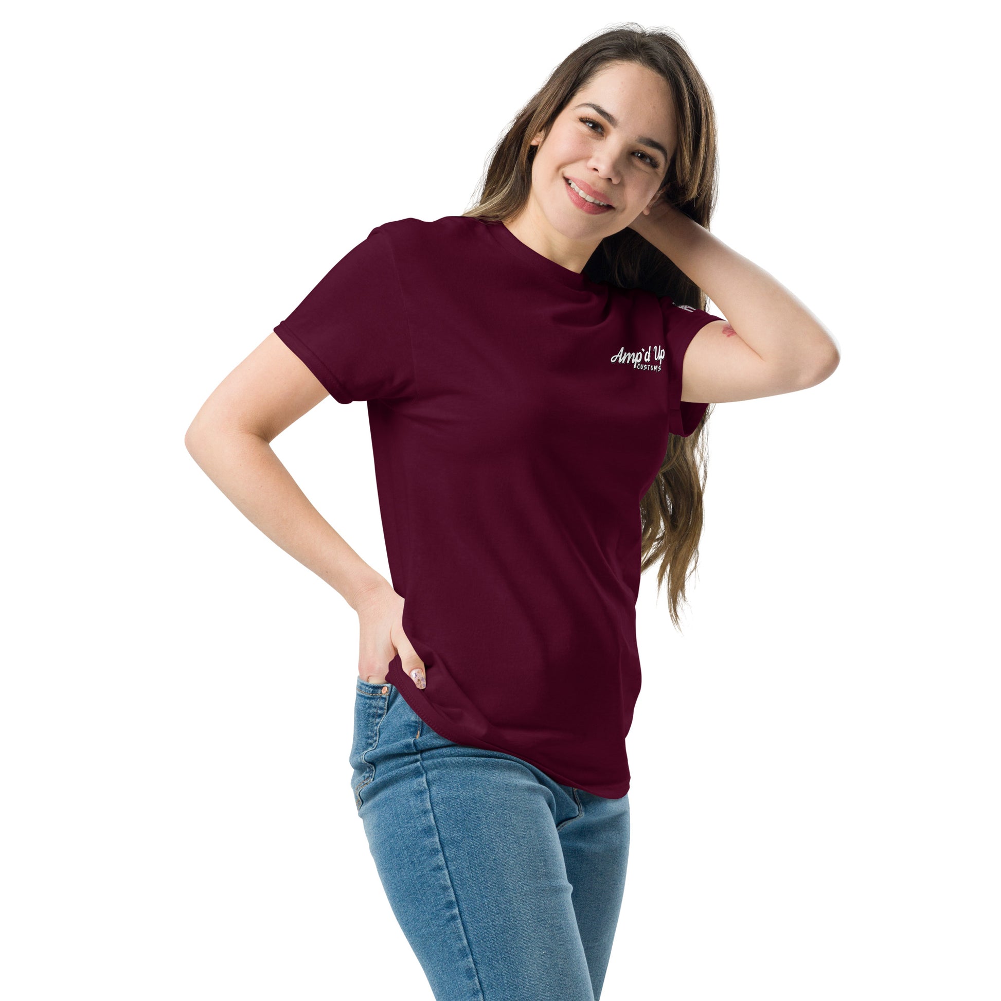 Woman wearing maroon Amp'd Up Custom Classic T-Shirt with small white logo on chest paired with blue jeans