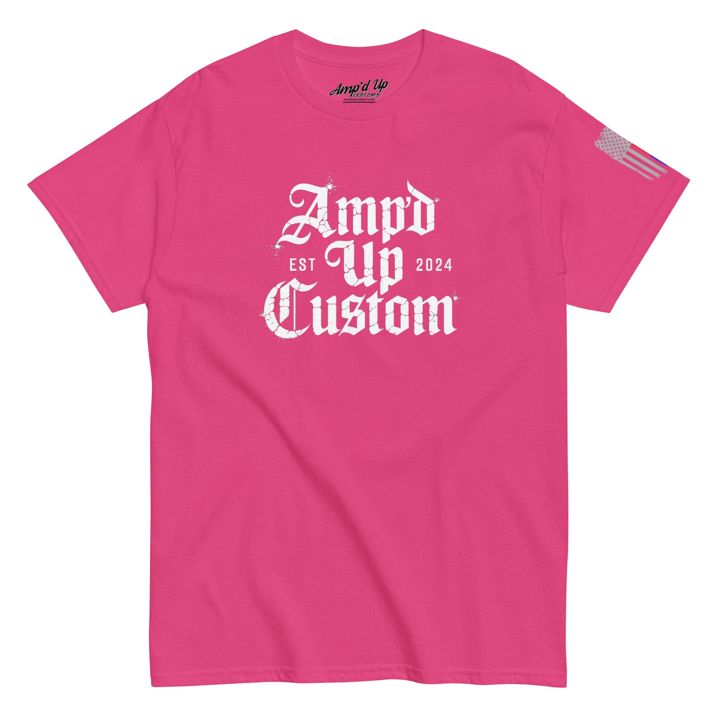 Bright pink crewneck Amp'd Up Custom EST2024 T-Shirt with white gothic front logo and small American flag on sleeve