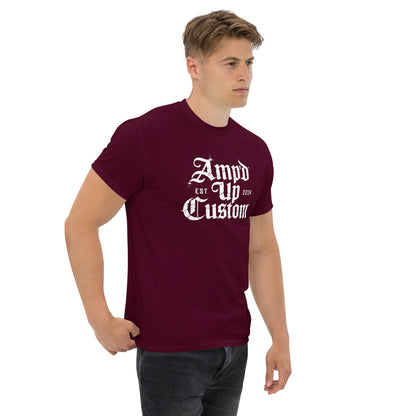 Male model wearing burgundy Amp'd Up Custom EST2024 T-Shirt with white gothic logo casual crew neck fit