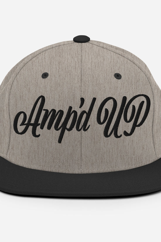 Amp'd Up cursive 3D Puff Snapback Hat in grey and black with stylish design for casual wear