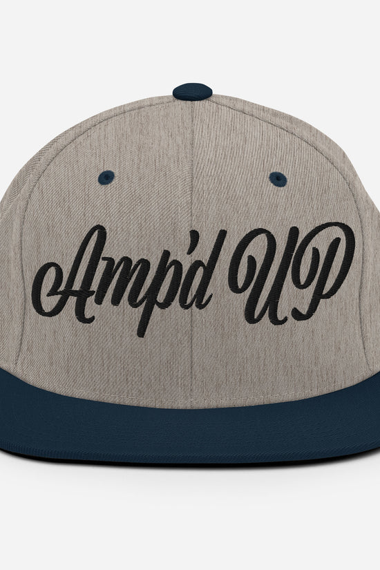 Amp'd Up cursive 3D Puff Snapback Hat in gray and navy for casual wear