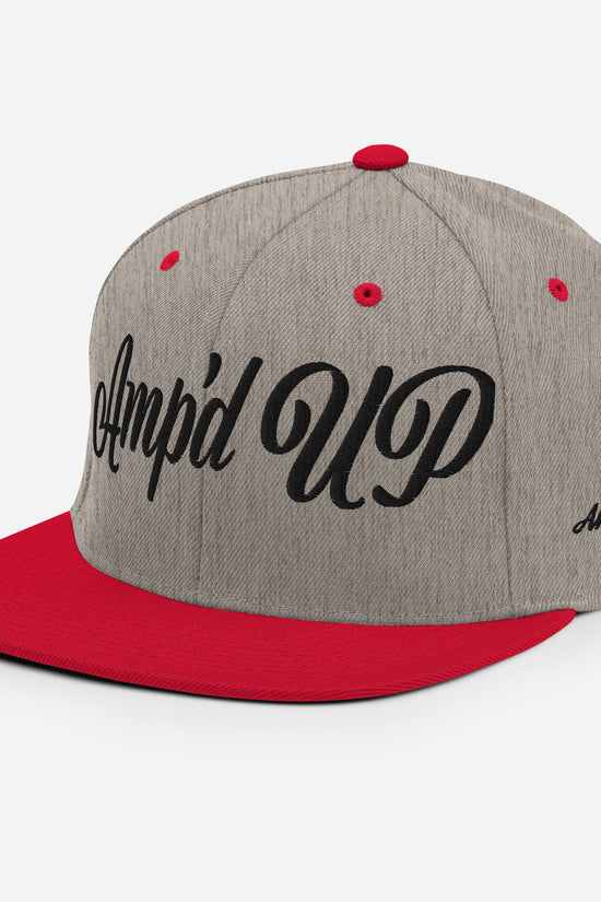 Amp'd Up cursive 3D Puff Snapback Hat in gray and red, featuring stylish embroidery for a trendy look