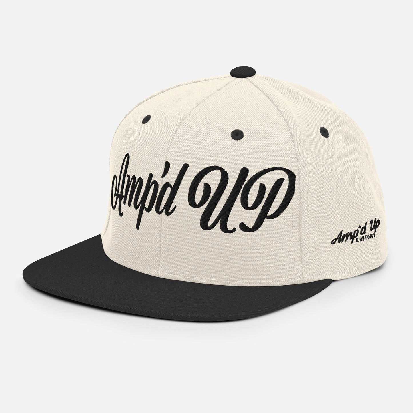 Amp'd Up cursive 3D Puff Snapback Hat in beige and black with stylish embroidered logo