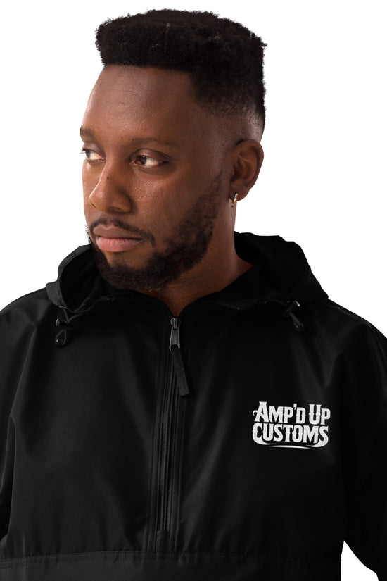 Amp'd Up Custom Embroidered Champion Packable Jacket in black, featuring a stylish hood and logo
