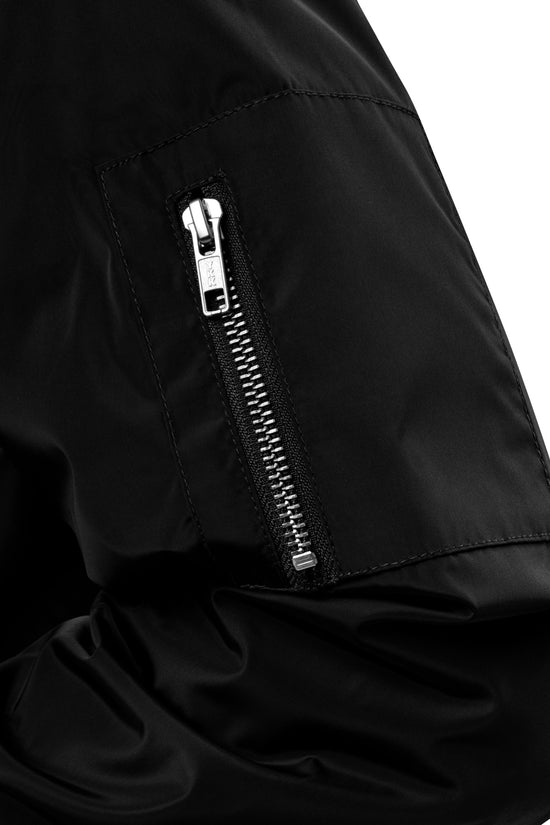 Close-up of Ampd Up Custom Premium recycled bomber jacket showcasing zipper detail on the sleeve