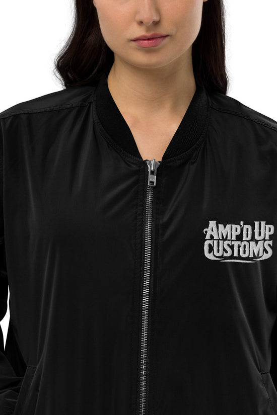 Amp'd Up Custom Premium recycled bomber jacket in black with a sleek design and logo
