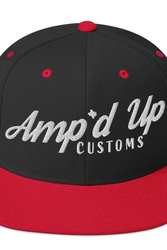 Amp'd Up Custom Snapback Hat in black and red with embroidered logo for stylish casual wear