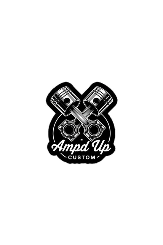 Ampd Up Customs Piston sticker featuring crossed pistons and a bold logo design