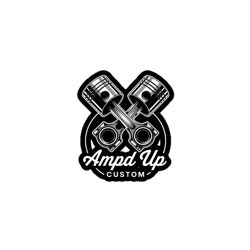 Ampd Up Customs Piston sticker featuring crossed piston designs in black and white