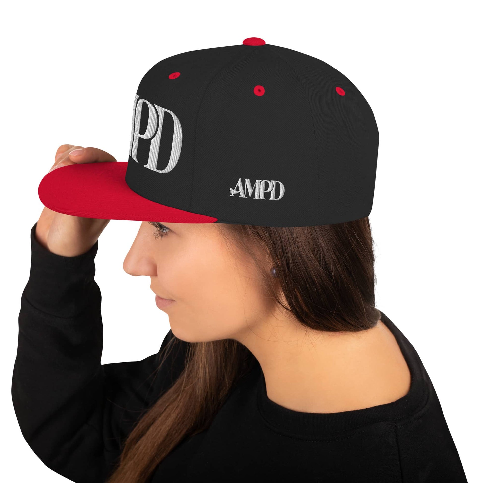 Ampd Up Logo Snapback hat in black and red worn by a woman for a stylish look