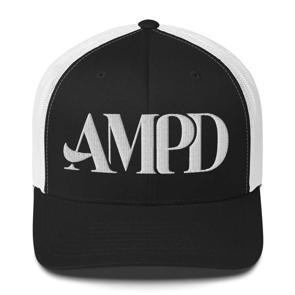 Amp'd Up Logo Trucker Cap in black and white featuring bold AMPD lettering on the front