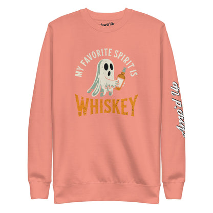 My Favorite Spirit Is Whiskey Sweatshirt. Coral crewneck with ghost holding whiskey bottle graphic and sleeve script