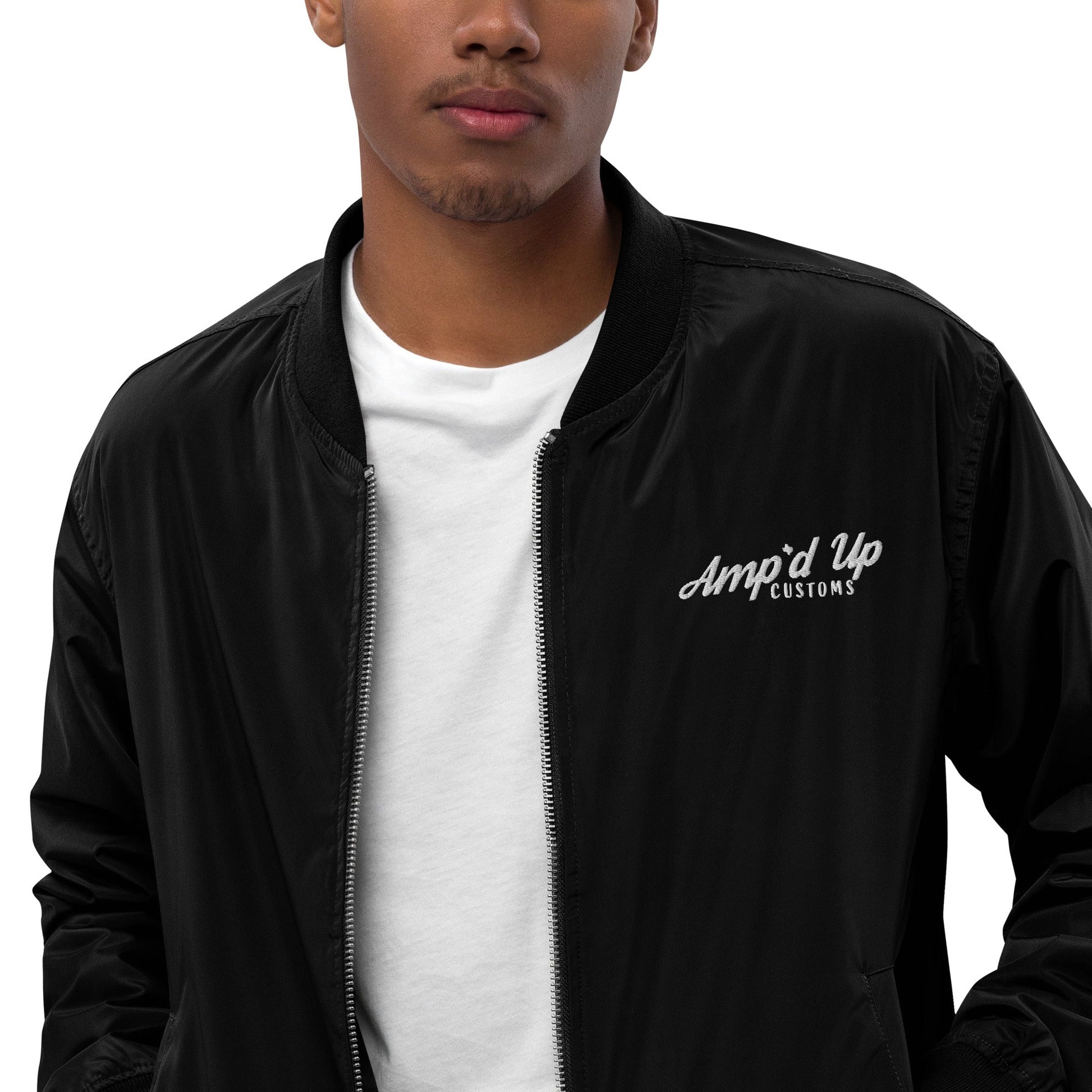 Amp'd Up Premium recycled bomber jacket in black worn by a model with a white shirt