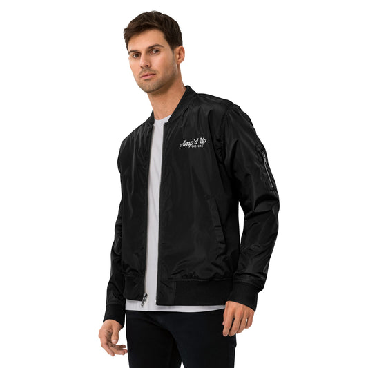 Man wearing an Amp'd Up Premium recycled bomber jacket in black with a sleek design
