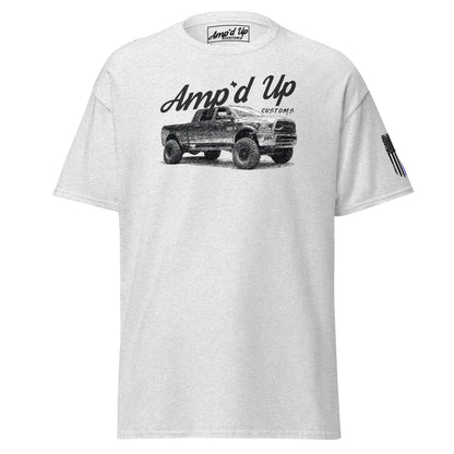White Amp'd Up RAM T-Shirt featuring a black graphic of a lifted RAM truck and amp'd up customs text