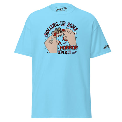 Amp'd Up Custom Rolling up Some Horror Spirit T-Shirt in light blue with graphic hands rolling a horror-themed joint