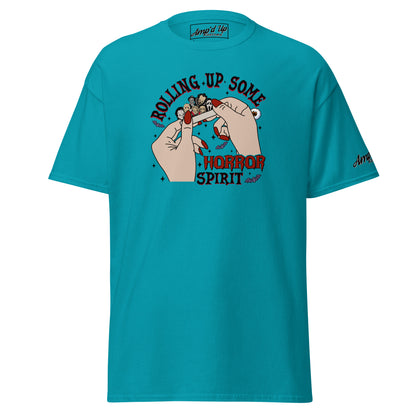 Rolling up Some Horror Spirit T-Shirt by Amp'd Up Custom in teal with graphic hands rolling a paper on front