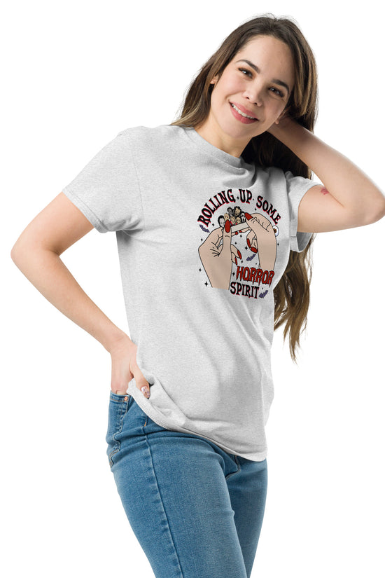 Woman wearing Amp'd Up Custom Rolling up Some Horror Spirit T-Shirt with horror-themed graphic design
