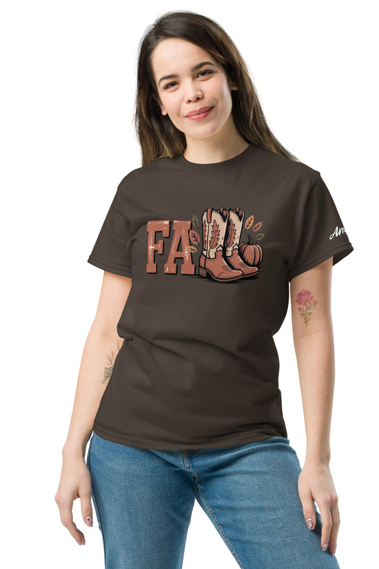 Woman wearing Amp'd Up Custom Southern Fall T-Shirt in brown with boots and fall leaves graphic