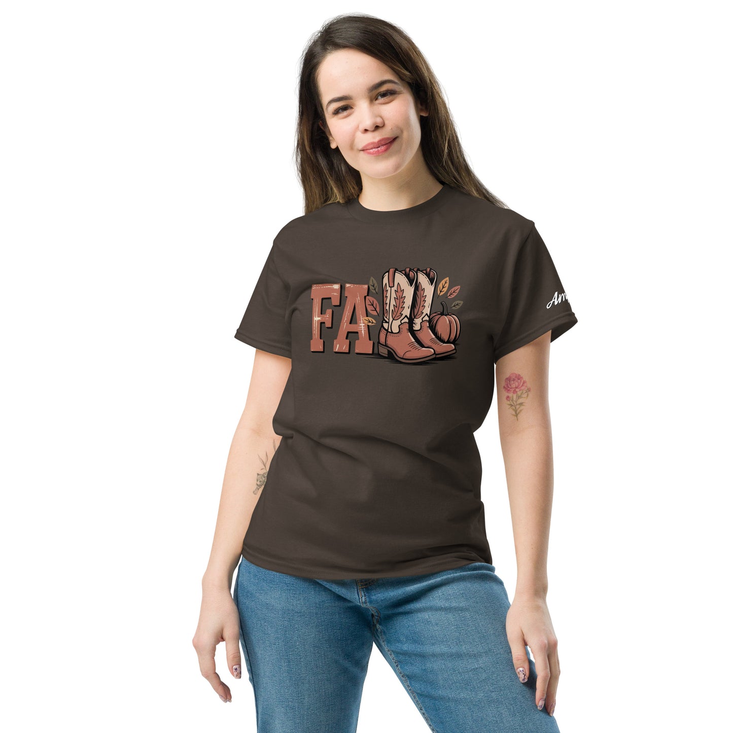 Woman wearing Amp'd Up Custom Southern Fall T-Shirt in brown with boots and fall leaves graphic