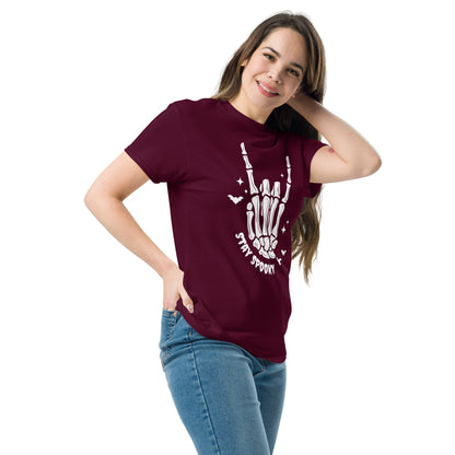Woman wearing a maroon Stay Spooky T-Shirt with white skeleton hand design from Amp'd Up Custom
