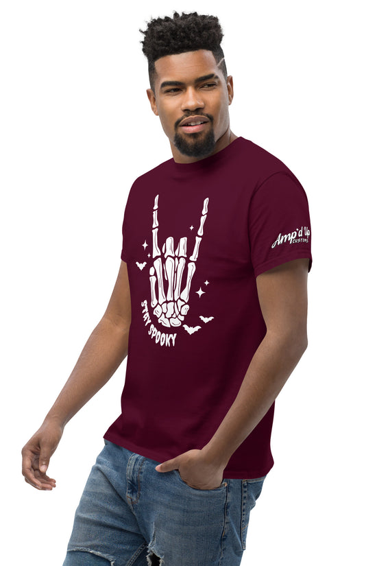 Man wearing a maroon Stay Spooky T-Shirt with a skeleton hand graphic and Amp'd Up Custom logo on sleeve