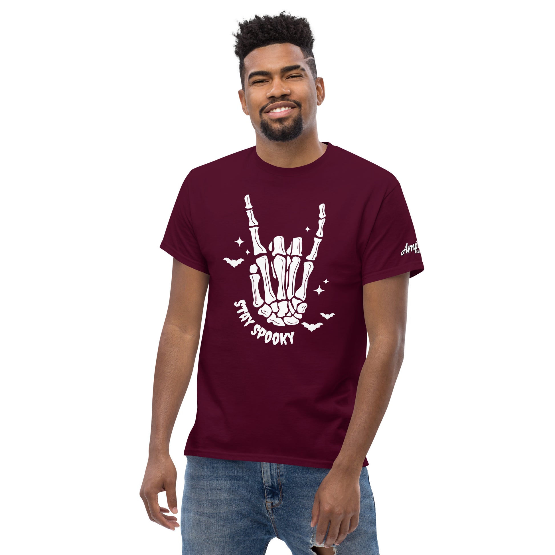 Stay Spooky T-Shirt by Amp'd Up Custom featuring skeleton hand and bats on a maroon tee