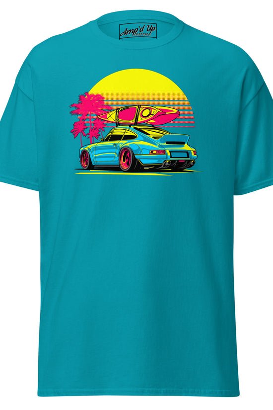 Sunset Porsche T-Shirt featuring a vibrant graphic with a car and surfboard against a sunset backdrop