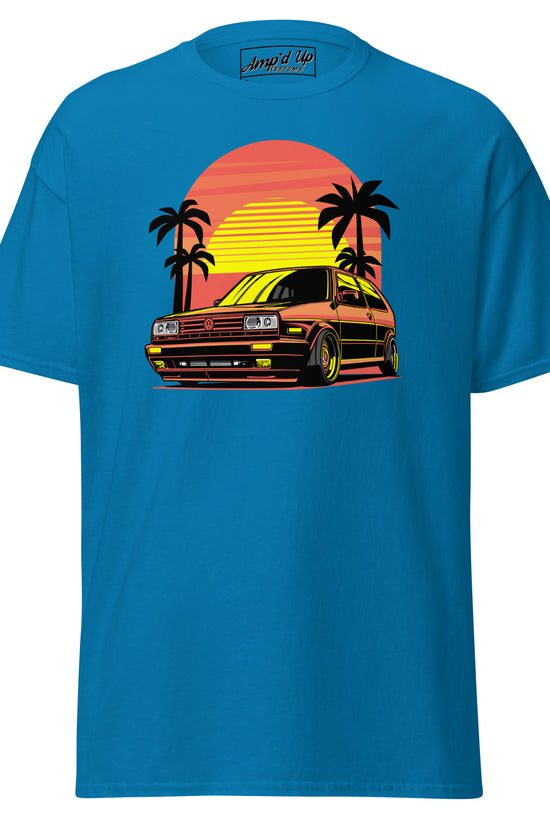 Amp'd Up Custom Sunset Volkswagen T-Shirt featuring a retro car design with palm trees