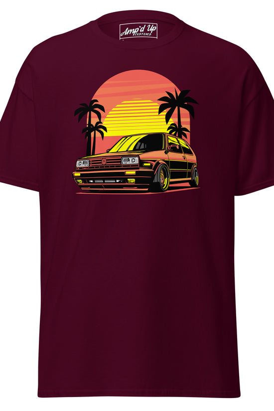 Sunset Volkswagen T-Shirt in burgundy featuring a retro car design with palm trees and sunset backdrop