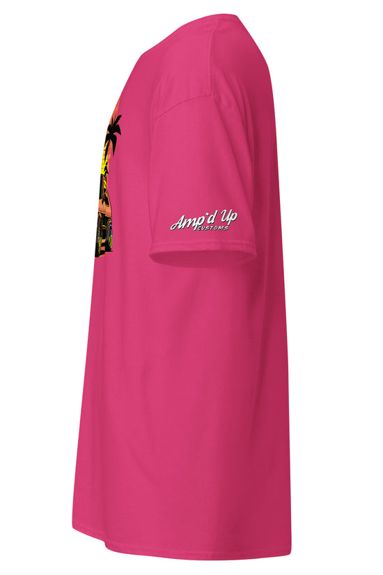Side view of a pink Sunset Volkswagen T-Shirt featuring a vibrant tropical design by Amp'd Up Custom