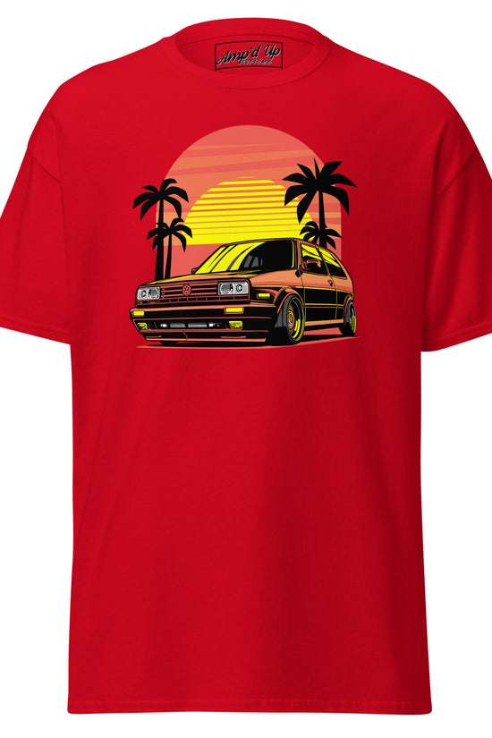 Red Sunset Volkswagen T-Shirt featuring a vibrant graphic with a car and palm trees