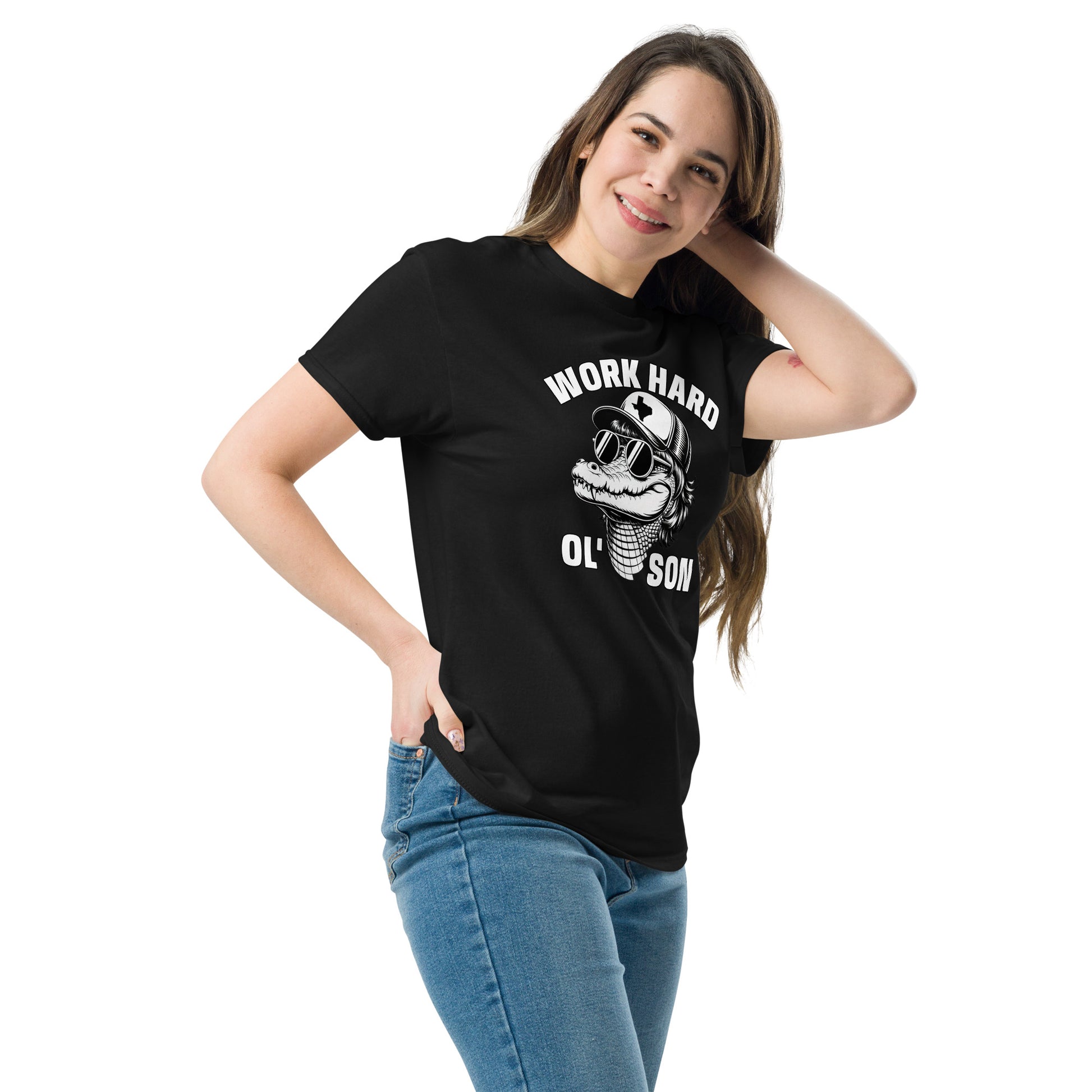 Woman wearing black Work Hard Ol' Son T-Shirt with graphic design and casual blue jeans