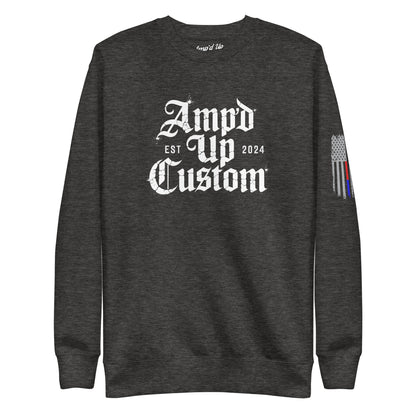 Dark charcoal crewneck sweatshirt with white gothic logo front and thin line flag sleeve detail Amp'd Up Custom EST2024 Sweatshirt