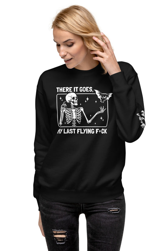 Black sweatshirt with skeleton and bat graphic featuring There It Goes My Last Flying Fck Sweatshirt design