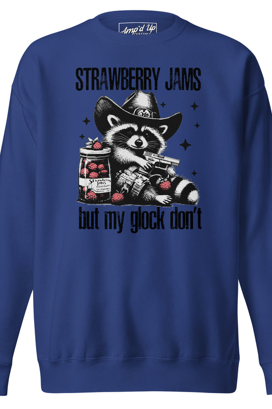 Amp'd Up Custom Strawberry Jams, But My Glock Don't sweatshirt featuring a raccoon with a gun and a jam jar
