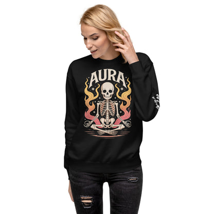 Black AURA Sweatshirt with skeleton and flame design worn by woman in ripped black jeans