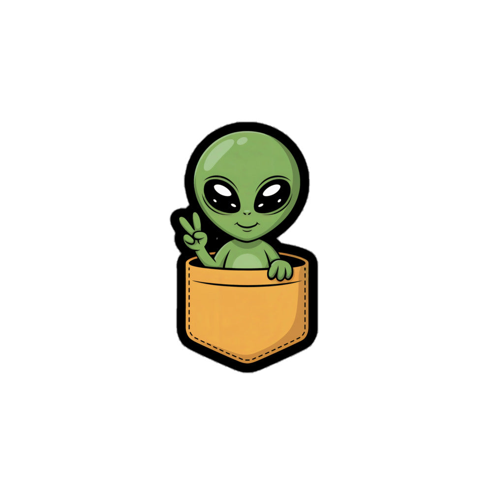 Cute Alien sticker showing a green alien giving peace sign from a brown pocket