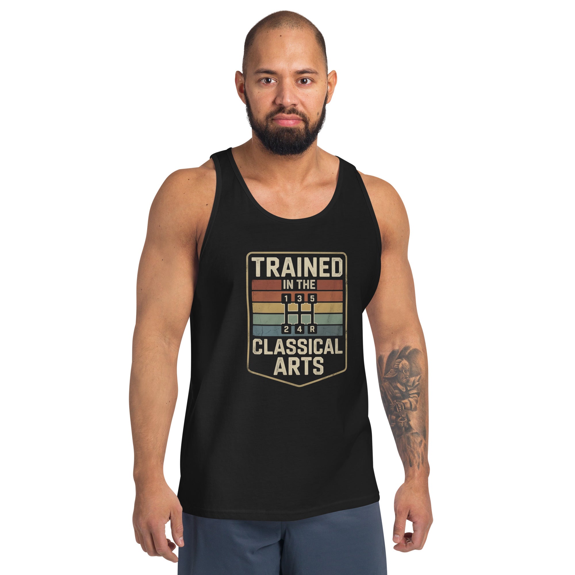 Man wearing a black tank top with 'Trained in the Classical Arts' text on a white background