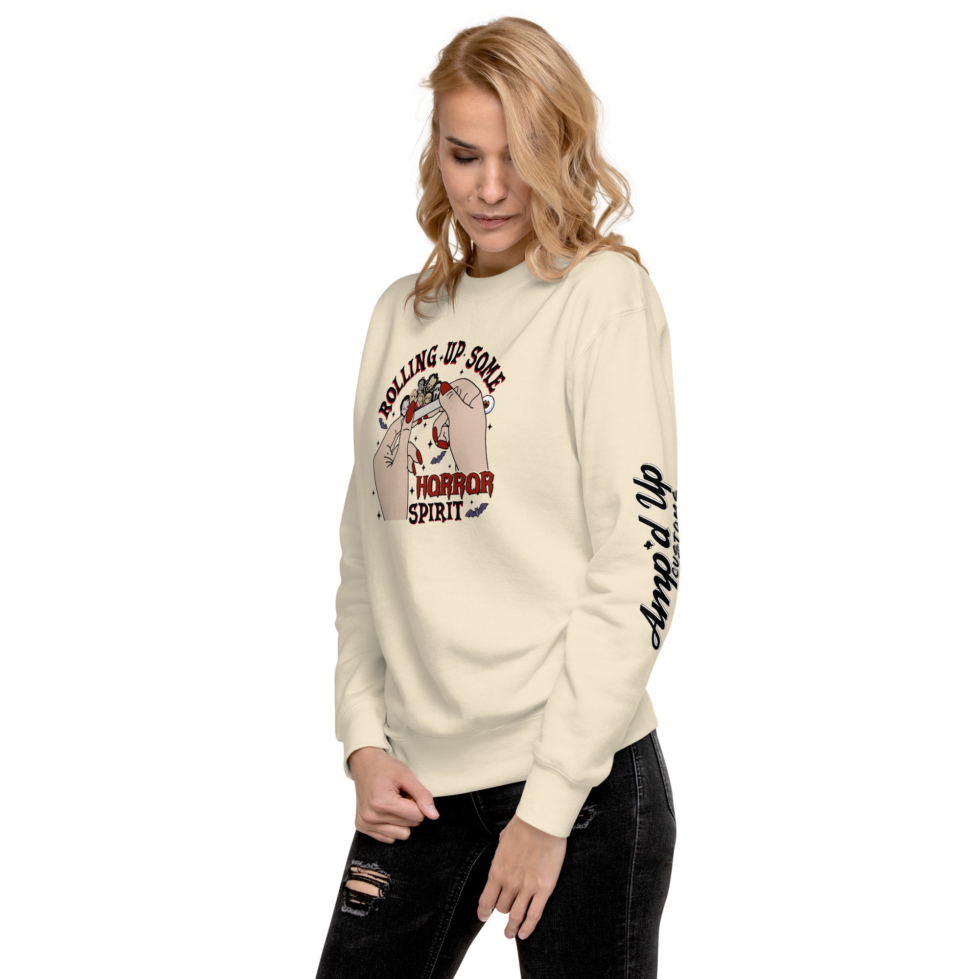 Amp'd Up Custom Rolling Up Some Horror Spirit Sweatshirt worn by woman in beige with black jeans