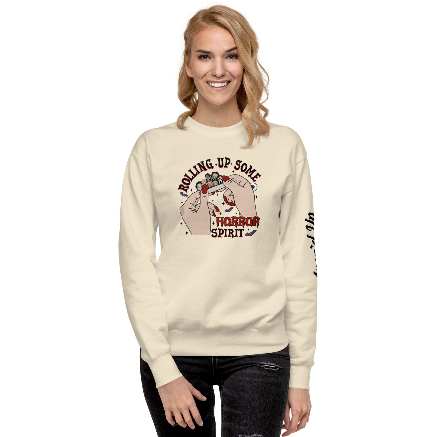 Woman wearing a cream sweatshirt with Amp'd Up Custom Rolling Up Some Horror Spirit Sweatshirt design