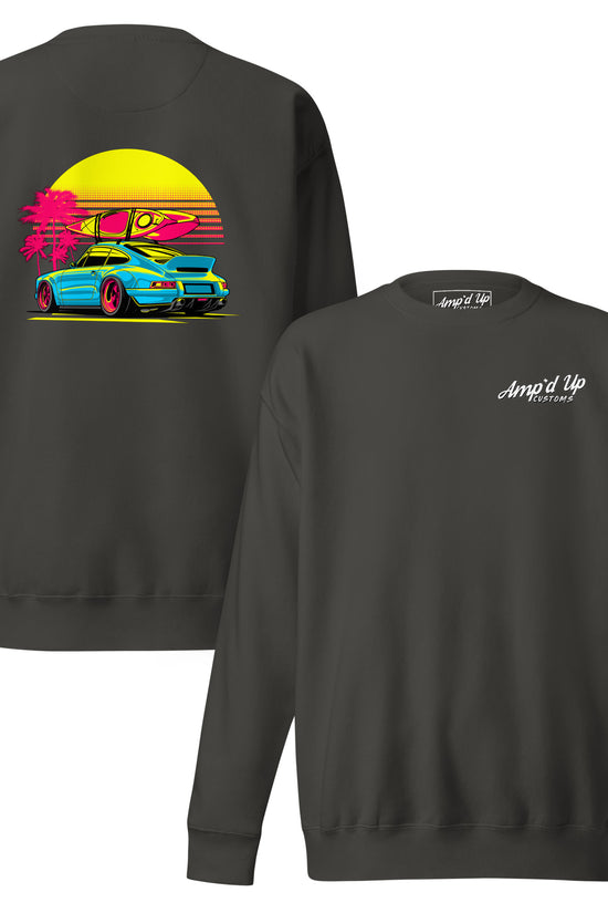 Amp'd Up Custom Sunset Porsche Sweatshirt with vibrant back illustration featuring a retro car and sunset